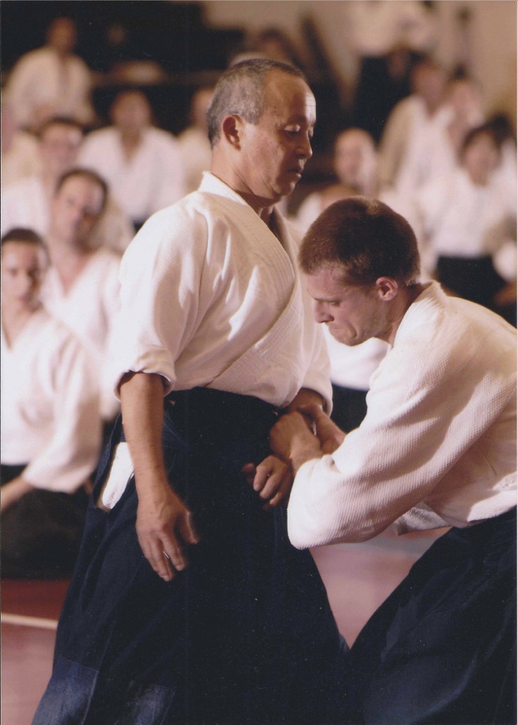 "His shoulders were relaxed and free of tension, and his hands, soft and extended, as if ready to hold a baby." Murashige Sensei at USAF Western Region (now Birankai) Summer Camp, c. 1998. Photo by Gary Payne, courtesy of Birankai.